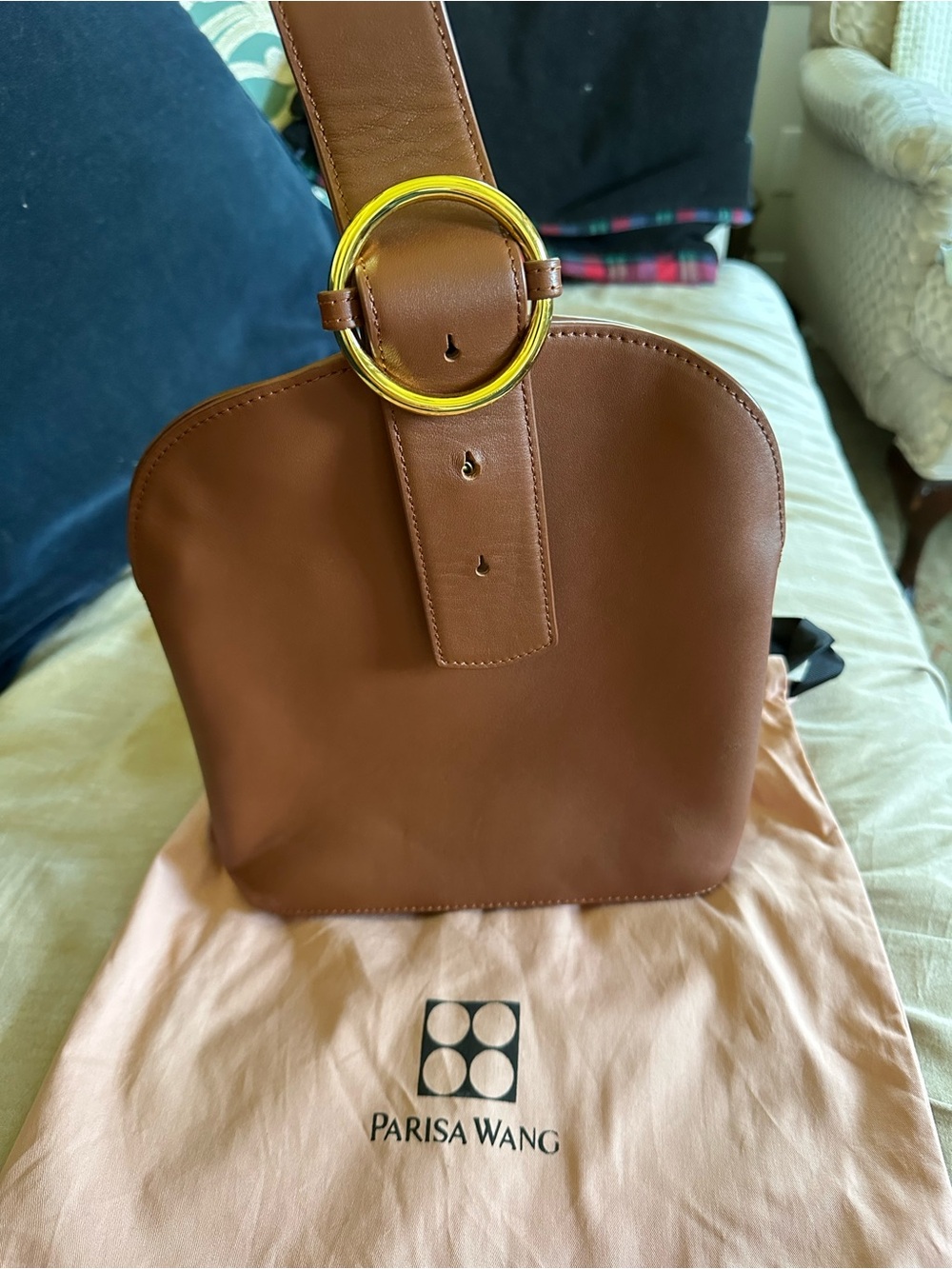 Parisa Wang brown handbag.